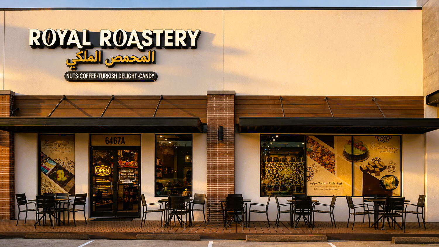 Royal Roastery coffee shop storefront with large illuminated sign, outdoor seating, and a clean parking lot in front.